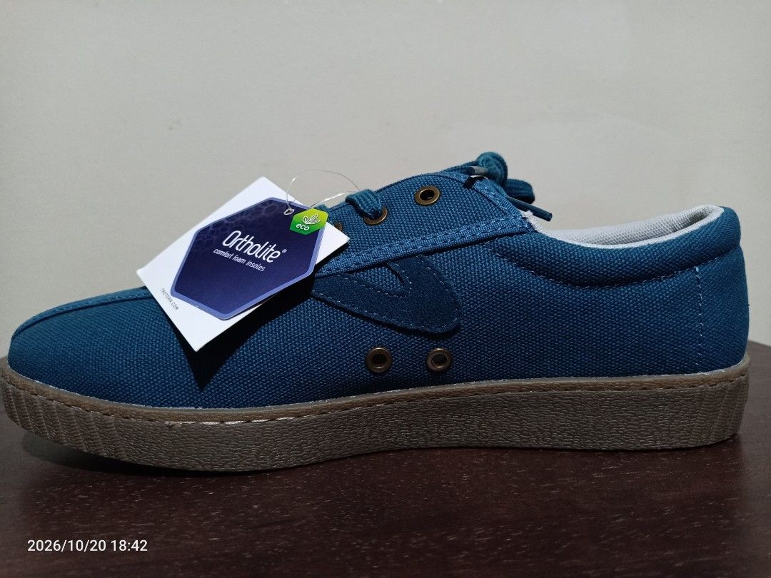Tretorn Nylite plus Canvas Sneakers (Category: Sneakers) located in Las Pinas. Submitted by OmengSoyT (Listing ID 1469309172, Image 2). Description: - Brand: Tretorn Sweden - Condition: Brand new with original tag attached.Guaranteed Authentic - Color: Teal blue with brown rubber soles and matching laces - Comfort: OrthoLite comfort foam insoles - Details: Metal eyelets on the sides and branding on the heel and sole.