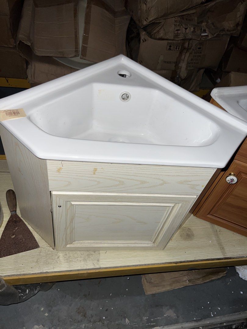 Triangular sink 58cm with cabinet (super sale) (Category: Looking For) located in Paranaque City. Submitted by pilipinashop (Listing ID 1469219790, Image 1). Description: Brand new Sale Srp: 6,600 Last stock, paunahan na lang po kayo Lilinisan lang namin loob ng cabinet bago e ship out, naalikabukan na kasi sa warehouse.