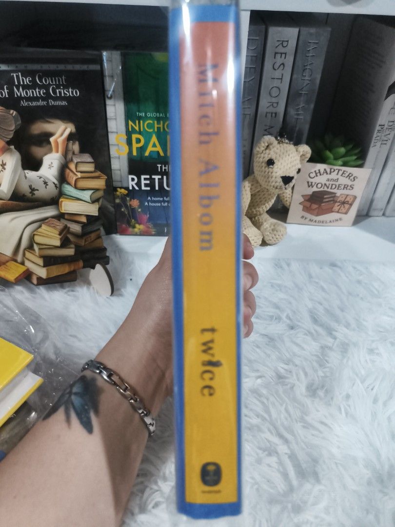 Twice by Mitch Albom Novel Target Exclusive (Category: Storybooks) located in Cabuyao City. Submitted by chaptersandwonders143 (Listing ID 1469315773, Image 3). Description: - Title: Twice by Mitch Albom - Edition: Target Exclusive with bonus content - Status: Brand new and sealed in original plastic packaging - Recognition: Good Morning America Book Club pick - Condition: Clean pages, sharp corners, pristine collector's condition.