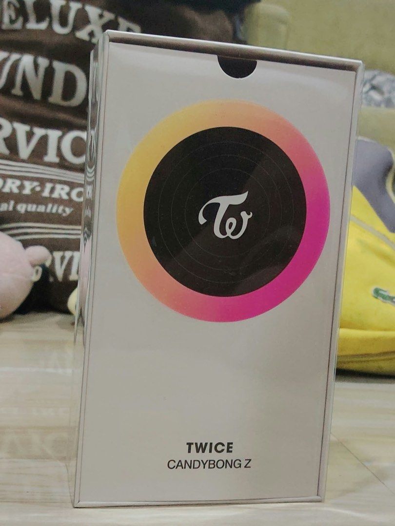 TWICE Candybong Z Official Lightstick with Box (Category: K-Wave Merchandise) located in Cainta. Submitted by emisshopping (Listing ID 1469174552, Image 2). Description: - Official TWICE Candybong Z lightstick - Tested and 100% working, lights up with the iconic TWICE logo - Comes with the original white box and attached wrist strap - RFS: Vet bills :(.
