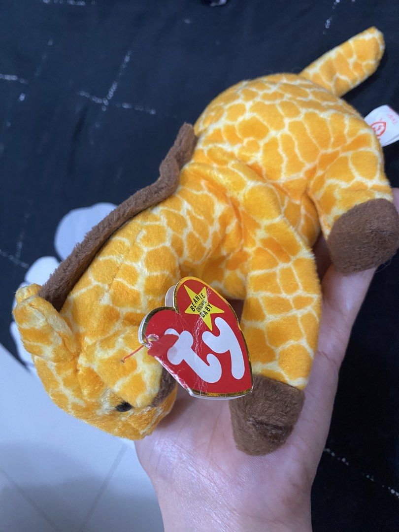 Ty beanie original baby twigs (Category: Plushies & Soft Toys) located in Santa Maria. Submitted by jordangail (Listing ID 1469252391, Image 1). Description: Rare ty 😍😍😍 - Brand: Ty Beanie Original Baby - Character: Twigs the Giraffe (Style 4068) - Birth Date: May 19, 1995 - Features: Vibrant yellow and brown giraffe pattern with soft plush material - Tags: Comes with original heart hang tag and tush tag - Condition: Well-maintained and clean 