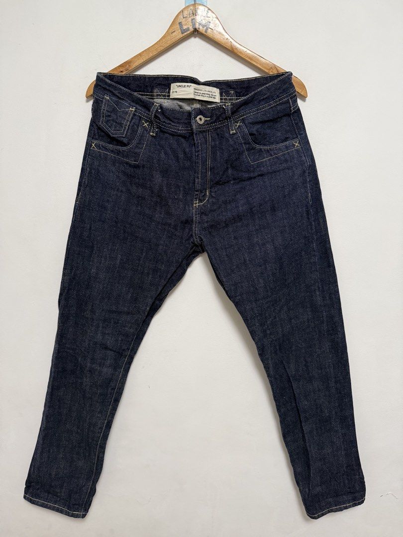 Uncle Fu Buckle Back Selvedge Jeans (Category: Jeans) located in Manila. Submitted by limsanity03 (Listing ID 1469299027, Image 2). Description: - Brand: Uncle Fu Maden Workwear - Style: Dark wash denim jeans with contrast stitching - Size: 33 (Model 175/82A) - Material: 100% cotton - Features: Back cinch buckle, calf hair style leather back patch, and custom graphic printed pocket lining - Condition: Unworn, properly stored Actual Dimes Waist 33