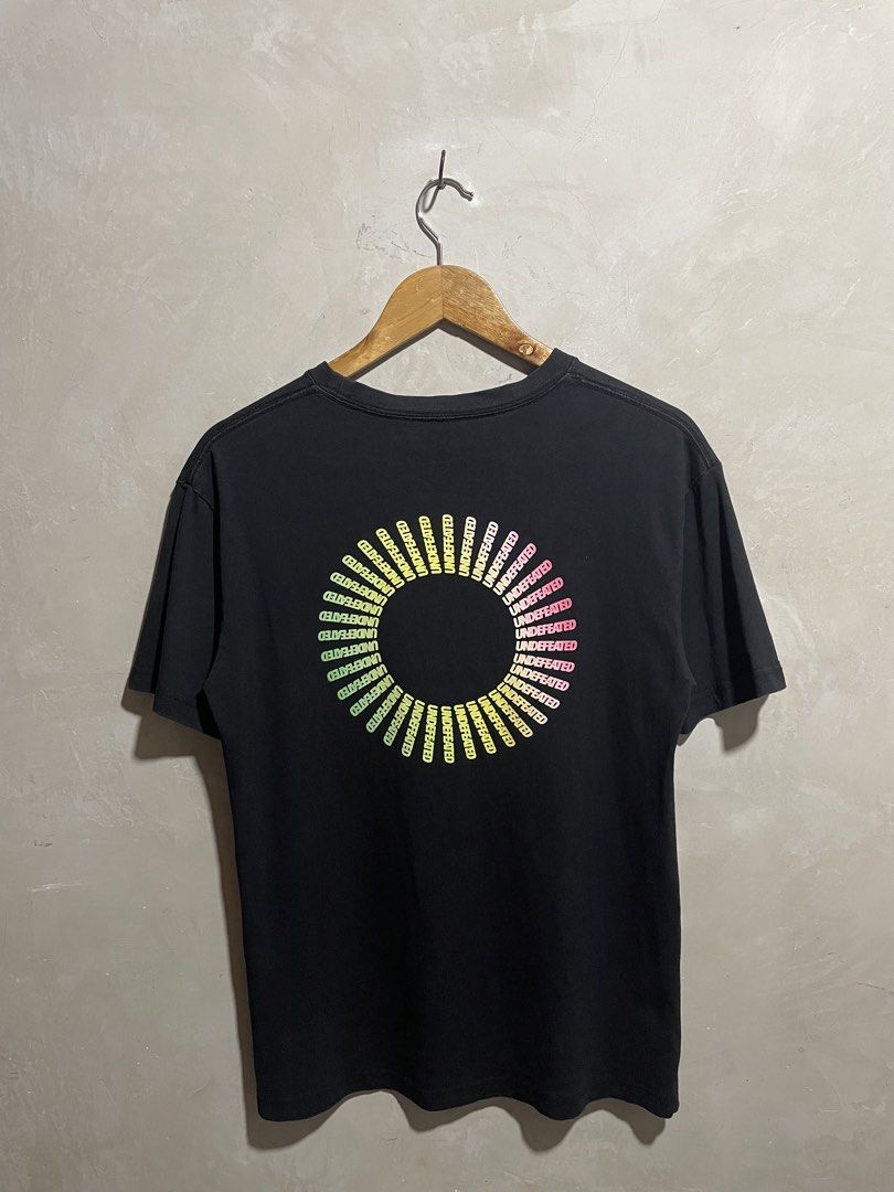 Undefeated Black T-Shirt with Gradient Logo (Category: Tshirts & Polo Shirts ) located in Zamboanga. Submitted by guthens (Listing ID 1469304723, Image 2). Description: Condition- excellent Issue- none Color rate- 9.5/10.
