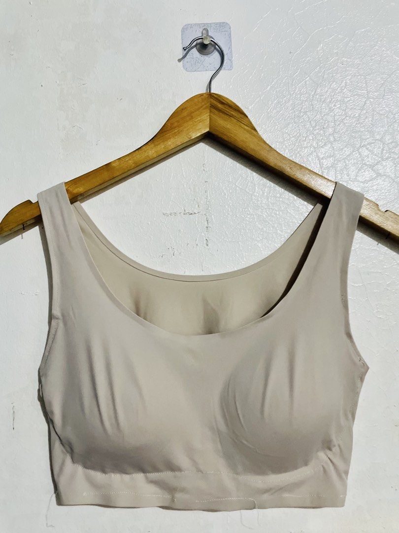 Uniqlo AIRism Padded Bra (Category: Undergarments & Loungewear) located in Caloocan City. Submitted by lovemyclothes21 (Listing ID 1469264977, Image 1). Description: - Brand: Uniqlo AIRism - Color: Neutral beige - Size: Medium (fits busts 35-37 inches) - Material: 77% nylon, 23% spandex - Design: Seamless with molded cups - Comfort: Lightweight, smooth, and perfect for everyday wear - Care: Machine washable on gentle cycle.