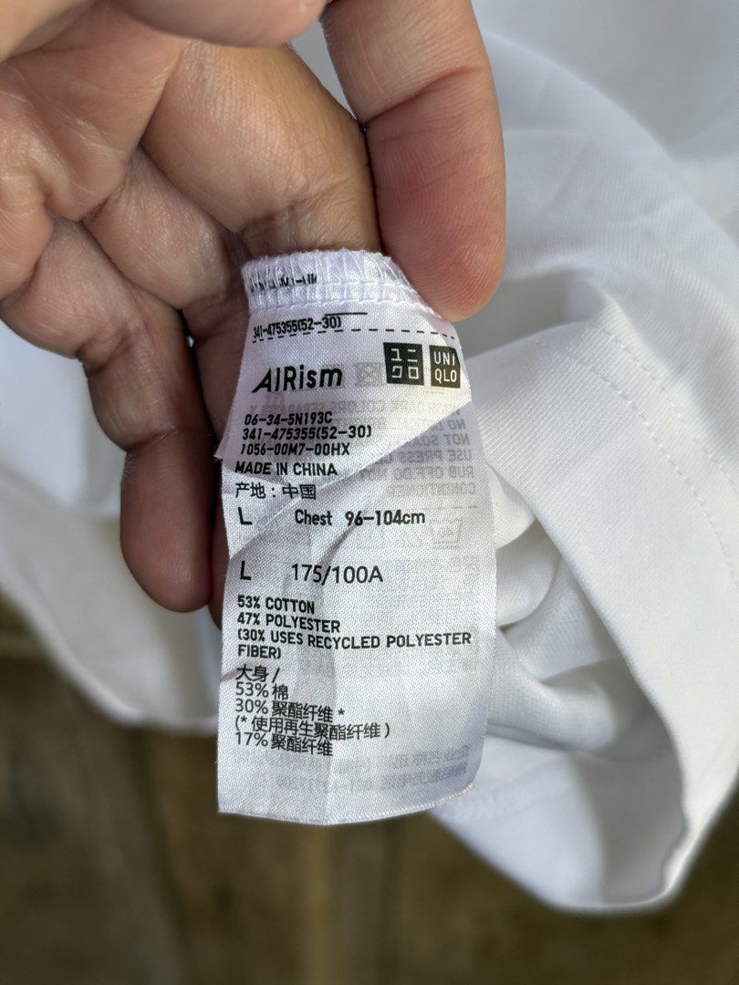 UNIQLO airism tee (Category: Tshirts & Polo Shirts ) located in Manolo Fortich. Submitted by thriftacktoe34 (Listing ID 1469203213, Image 3). Description: Excellent condition Color rate 9.5/10 Size Large Dimes W23 x L27 Issue: minimal yellow stain sa may tip ng front neckline FREE shipping fee.