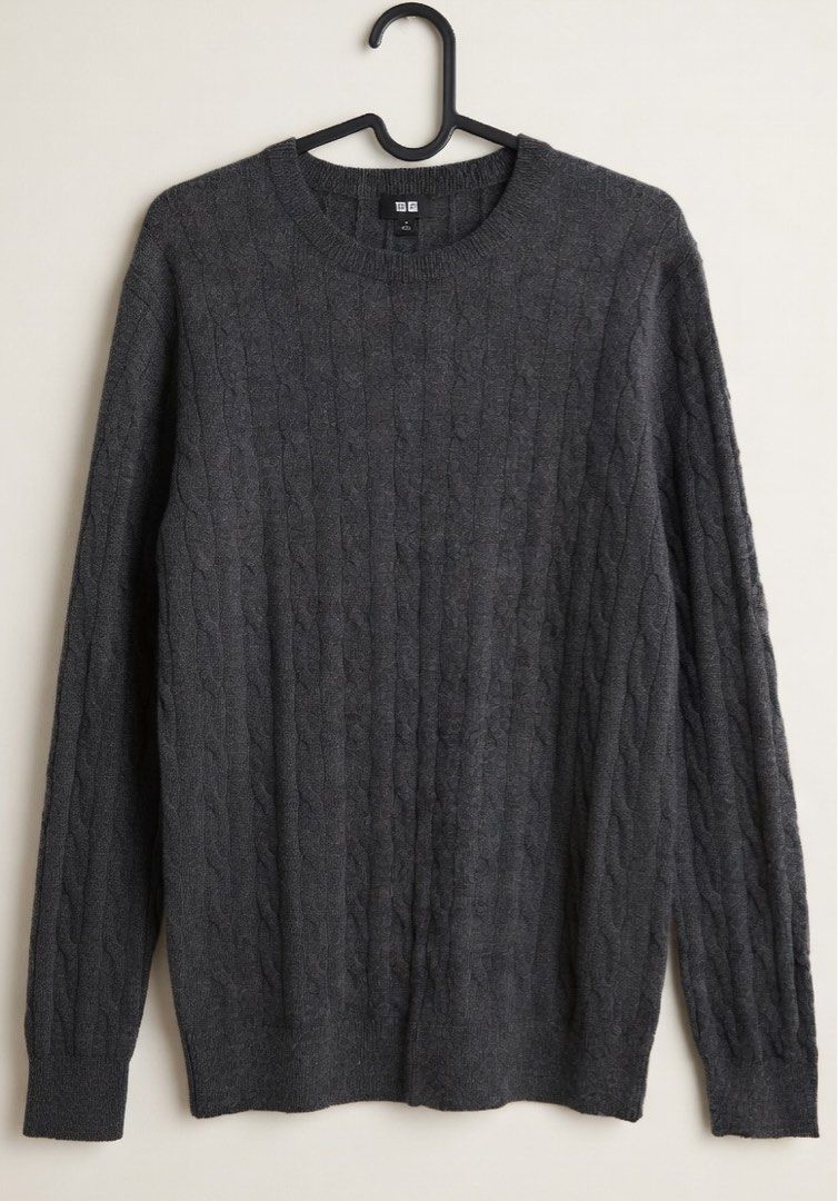 Uniqlo Grey Cable Knit Crew Neck Sweater (Category: Coats, Jackets and Outerwear) located in Quezon City. Submitted by aussomefinds (Listing ID 1465619138, Image 1). Description: - Brand: Uniqlo - Color: Grey - Style: Classic crew neck cable knit sweater - Features: Textured pattern on front and sleeves, ribbed cuffs and hem - Material: Lightweight knit - Condition: Like new - Perfect for layering and cool weather.