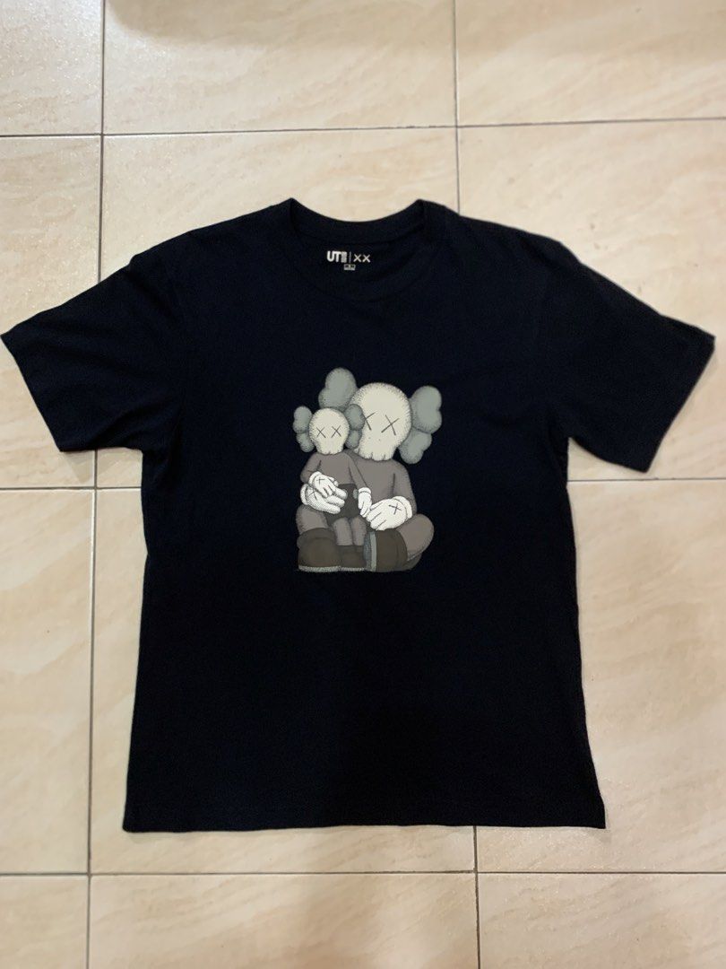 UNIQLO KAWS SHIRT (Category: Formal Shirts) located in Naga. Submitted by dunxx (Listing ID 1469290523, Image 1). Description: Dimes: 18 x 26 ( S on tag ) Condition: Brandnew condi Issue: None Mop: Gcash Courrier: JnT Dm for more dets!.