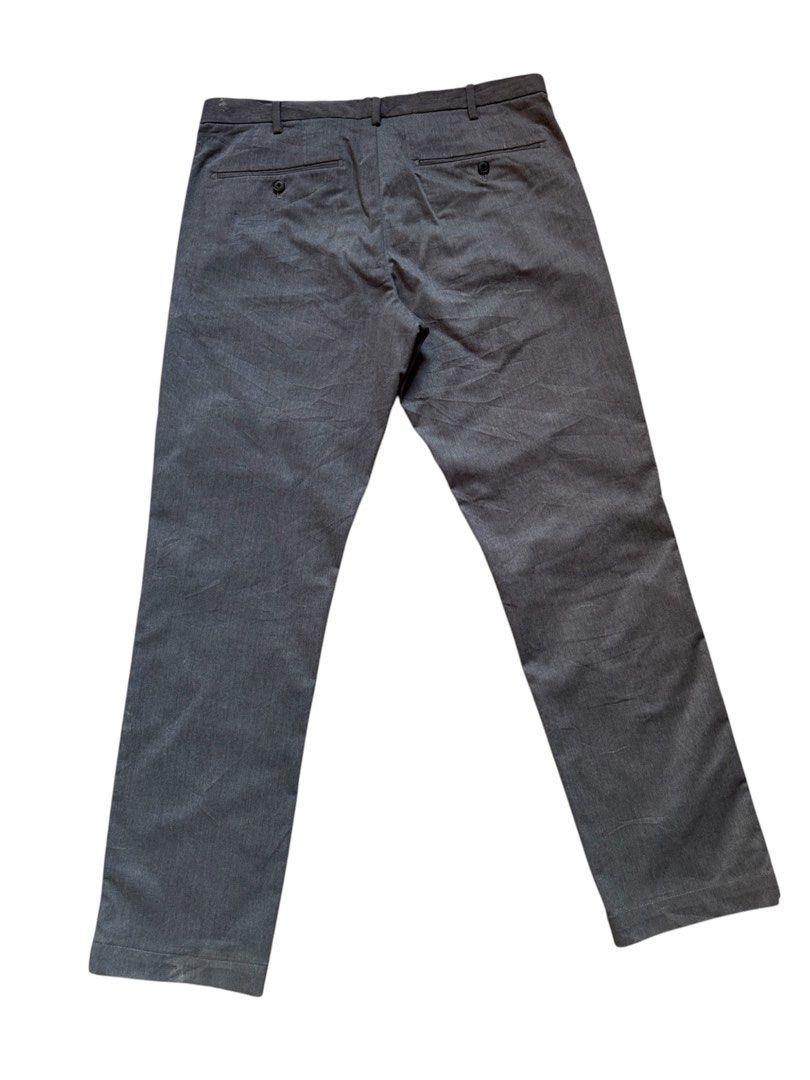 Uniqlo Trousers (Category: Chinos) located in Kabankalan. Submitted by secondhandgemsz (Listing ID 1469241083, Image 1). Description: Size 34-36w x 39L x 7hem Like new No flaws Dark grey.