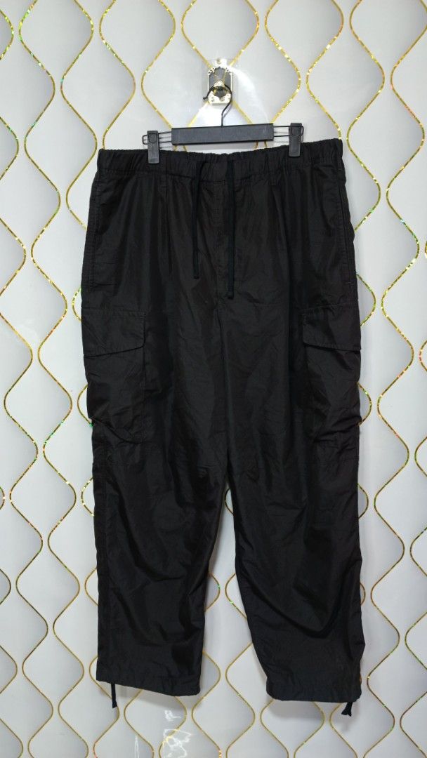 Uniqlo U Black Cargo Pants (Category: Trousers) located in Manila. Submitted by zariyah.1986 (Listing ID 1469182778, Image 1). Description: - Brand/Model: Uniqlo U Cargo Pants - Color: Black - Size: XL on tag (Fits waist 36 to 38) - Fit: Relaxed fit for all-day comfort - Material: Cotton blend - Waistband: Drawstring for an adjustable fit - Hems: Adjustable cuffs at the bottom - Pockets: Multiple utility pockets on the sides - Condition/Use: Grea