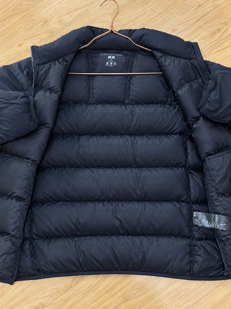 UNIQLO Ultra Light Down / Puffer Jacket (Category: Coats, Jackets and Outerwear) located in Manila. Submitted by manifestd (Listing ID 1469255667, Image 2). Description: UNIQLO Ultra Light Down / Puffer Jacket ✔️Dark blue (almost black) ✔️Medium on tag but fits large with room to layer 23” width, 26-27” length ✔️Ultra lightweight but strong insulation ✔️Packable, with zippered pockets ✔️Horizontal baffling that helps evenly distribute the insulat