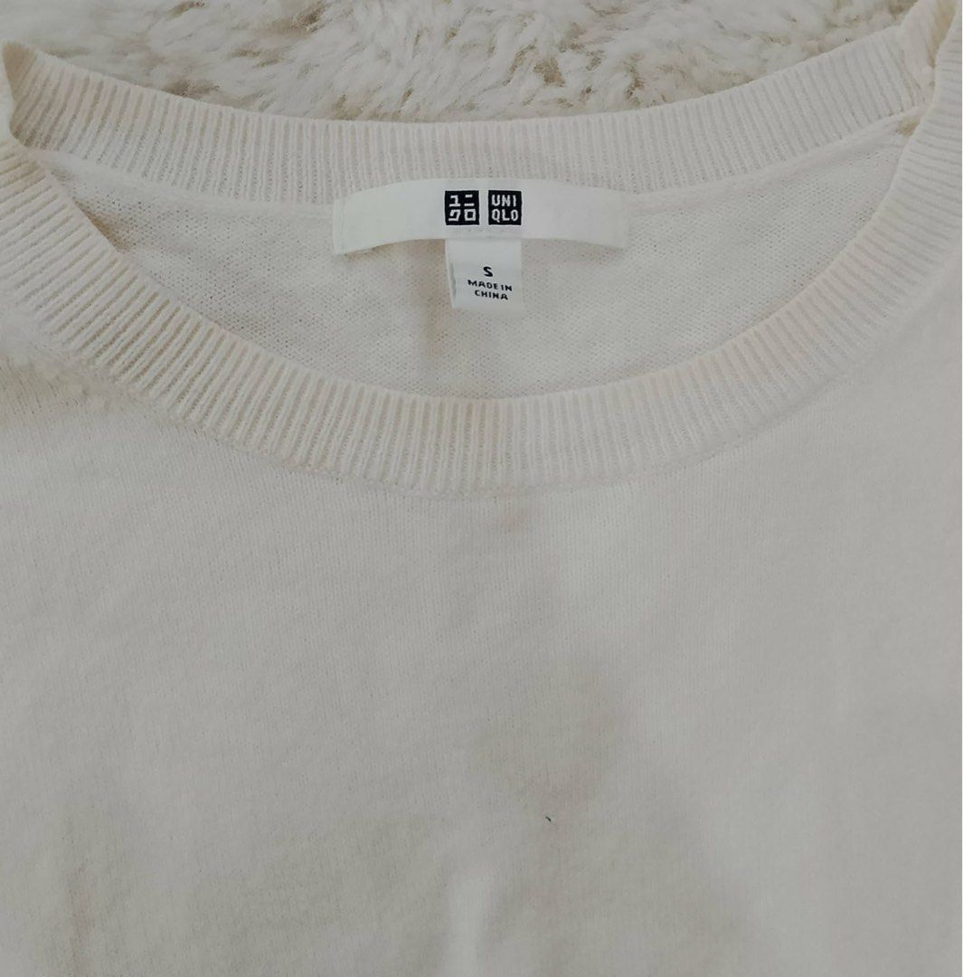 Uniqlo White Knit Sweater Size S (Category: Longsleeves) located in Manila. Submitted by istinbari05430 (Listing ID 1469190728, Image 2). Description: - Brand: Uniqlo - Item: Crew Neck Sweater - Color: Solid White - Size: Small (tag attached) - Material: Lightweight knit - Features: Long sleeves with ribbed cuffs and hem.