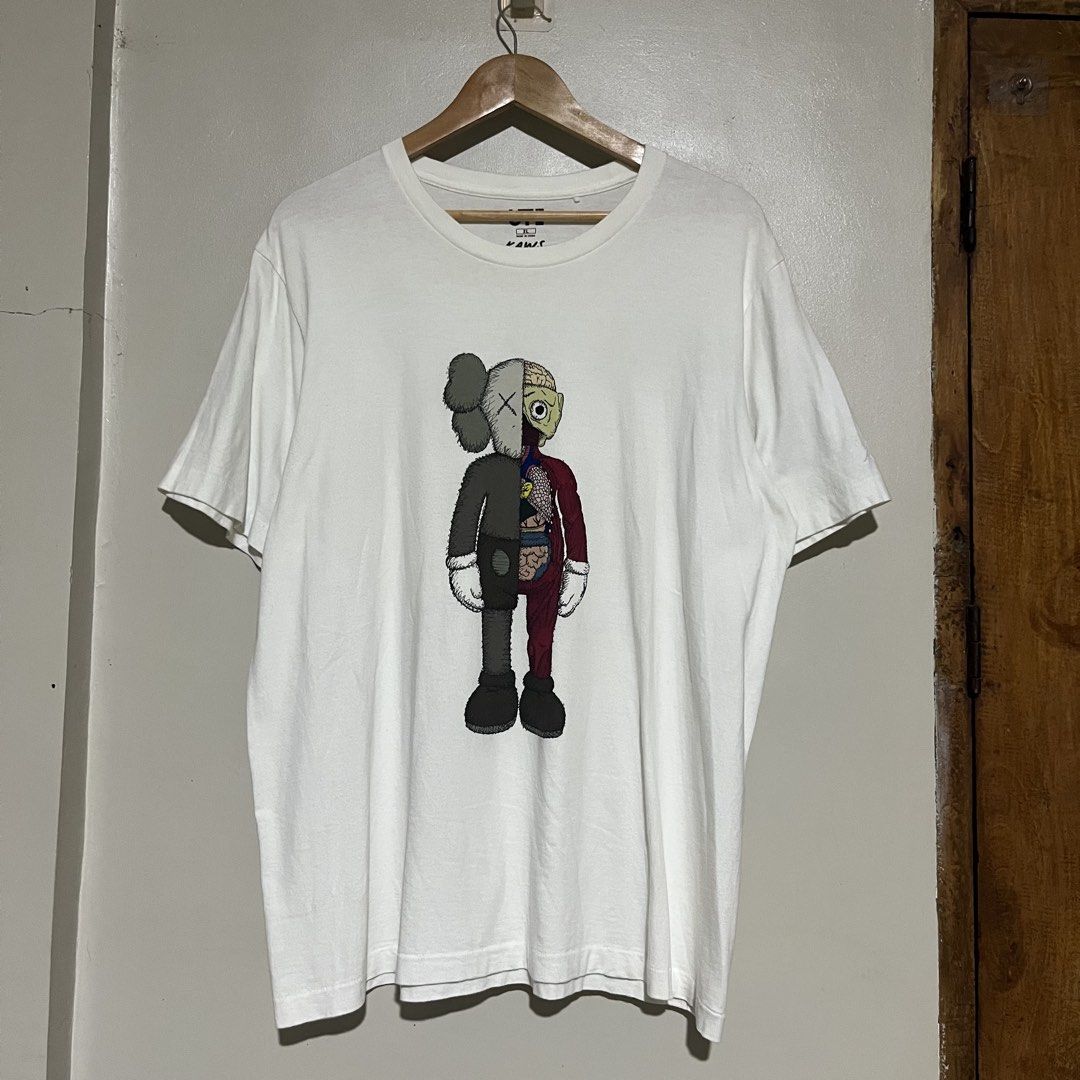 Uniqlo x KAWS Flayed White Tee Size XL (Category: Tshirts & Polo Shirts ) located in Argao. Submitted by secondcyclecollection (Listing ID 1469295652, Image 1). Description: - Brand: Uniqlo UT x KAWS - Design: Iconic Flayed Companion graphic on front with embroidered XX logo on the right sleeve - Color: White - Size: XL - Style: Standard crew neck, short sleeves - Condition: Clean overall, well-maintained - Origin: Made in China - Perfect for str