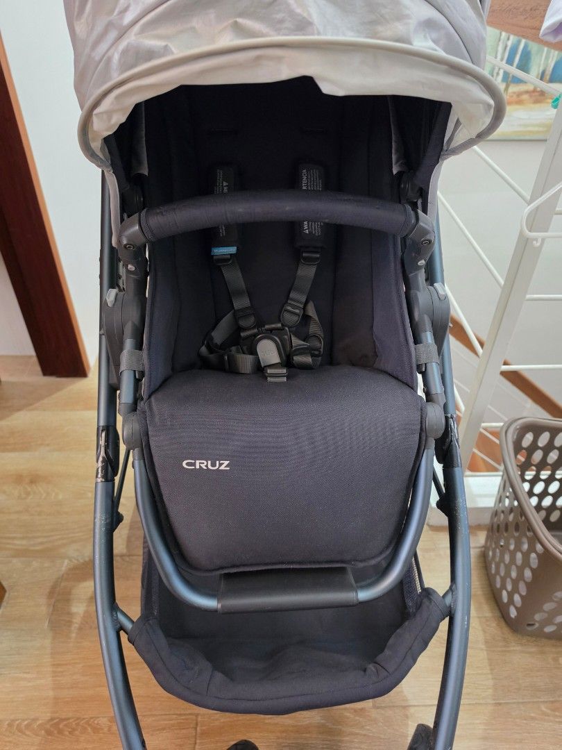 UPPAbaby Cruz Stroller Grey and Black (Category: Strollers) located in Muntinlupa City. Submitted by graciehart_08-99793 (Listing ID 1469161864, Image 3). Description: - Authentic UPPAbaby Cruz stroller in stylish grey and black - Large canopy with extendable sunshade for UV protection - Reversible seat unit (face forward or parent-facing) - Sleek black frame with durable wheels and comfortable foam grip handlebar - Extra-spacious under-seat bask