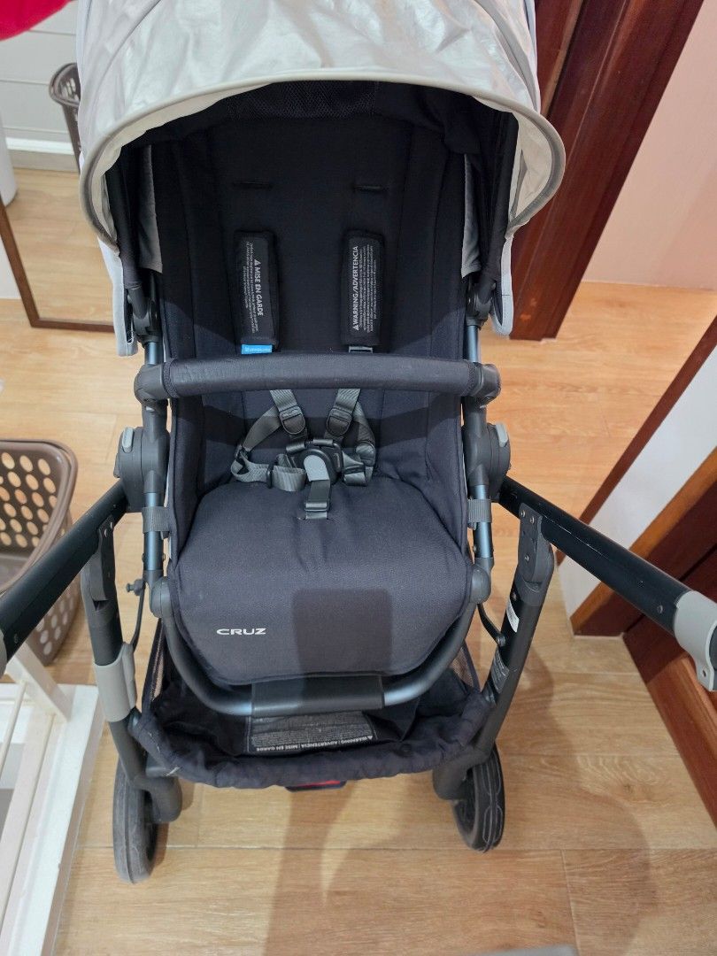 UPPAbaby Cruz Stroller Grey and Black (Category: Strollers) located in Muntinlupa City. Submitted by graciehart_08-99793 (Listing ID 1469161864, Image 2). Description: - Authentic UPPAbaby Cruz stroller in stylish grey and black - Large canopy with extendable sunshade for UV protection - Reversible seat unit (face forward or parent-facing) - Sleek black frame with durable wheels and comfortable foam grip handlebar - Extra-spacious under-seat bask