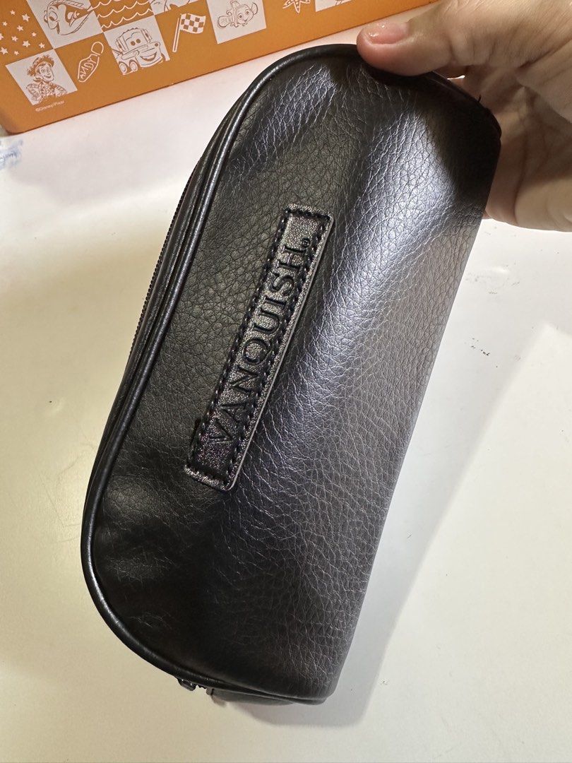 Vanquish Black Faux Leather Pouch (Category: Purses & Pouches) located in Davao. Submitted by favoritepreloved (Listing ID 1469195370, Image 1). Description: 💜 Size: 10cm height x 20cm width x 5cm.