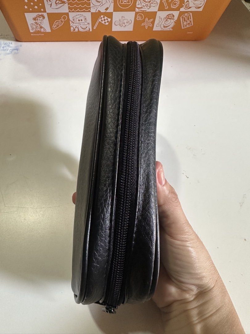 Vanquish Black Faux Leather Pouch (Category: Purses & Pouches) located in Davao. Submitted by favoritepreloved (Listing ID 1469195370, Image 3). Description: 💜 Size: 10cm height x 20cm width x 5cm.