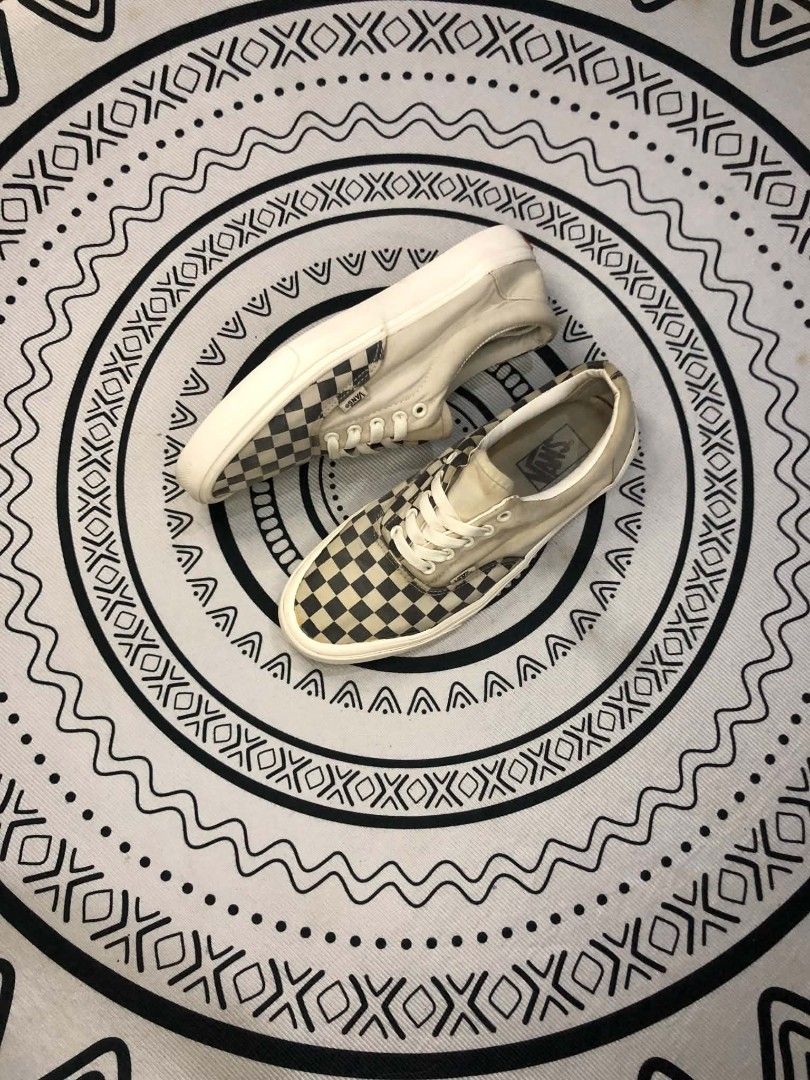 Vans Checkerboard Era Skate 🫶 (Category: Sneakers) located in Manila. Submitted by sonkicks (Listing ID 1469314736, Image 2). Description: - Brand: Vans - Style: Classic Checkered Skate Shoes - Colorway: Cream and Black - Size: US Men 10.5 / US Women 12.0 / UK 9.5 / EUR 44.0 - Features: Low-top design, lace-up fastening, signature waffle rubber outsoles, and red 'Off The Wall' heel patch - Perfect for casual, everyday wear.