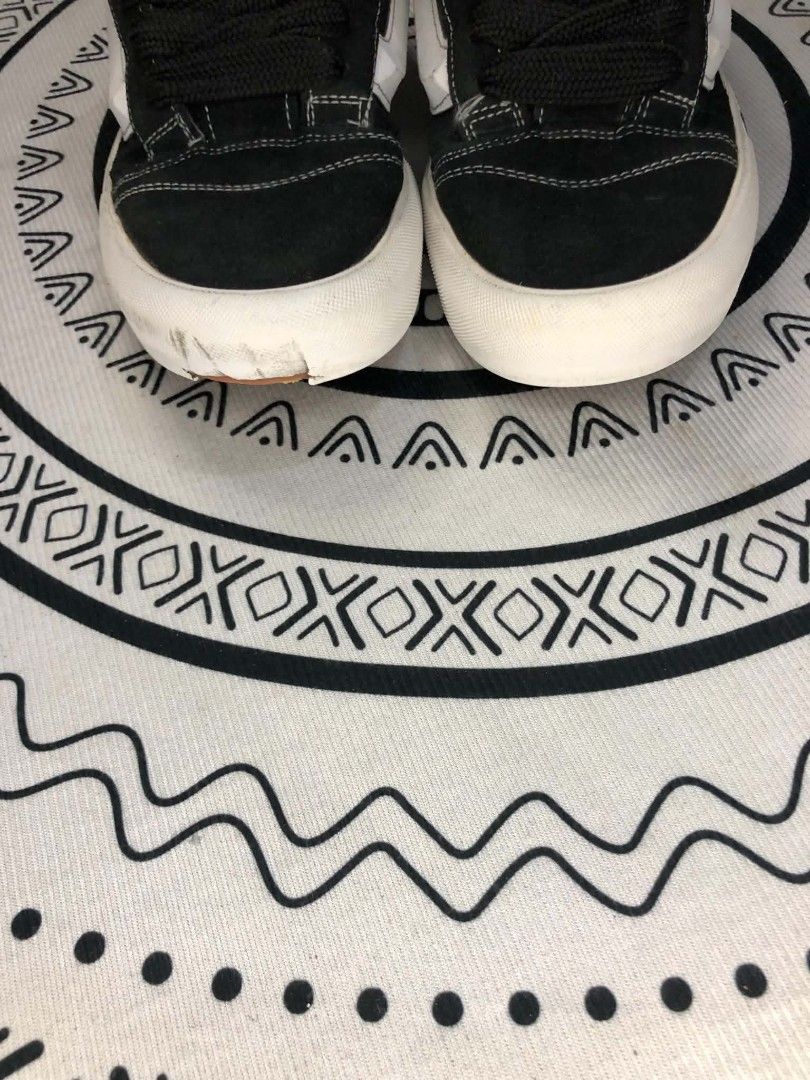 Vans Knu Skool Black White Skate 🫶 (Category: Sneakers) located in Manila. Submitted by sonkicks (Listing ID 1469312640, Image 3). Description: - Model: Vans Knu Skool (Black and White) - Style: Chunky laces, puffy tongue, and signature side stripe - Sole: Waffle grip outsoles with plenty of tread left - Details: Red 'Vans Off The Wall' logo patch on the heel - Condition: Good pre-loved condition with minor scuffing on the front toe bumper of th