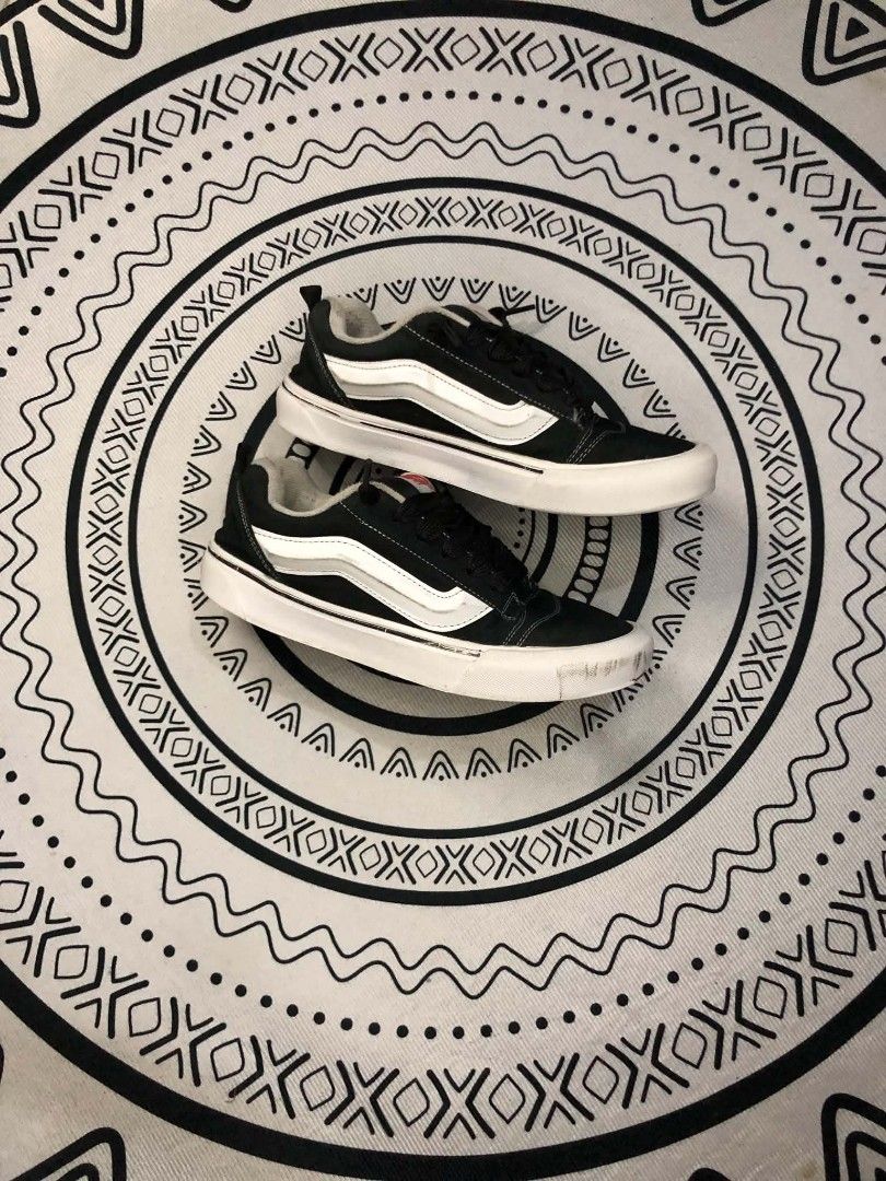 Vans Knu Skool Black White Skate 🫶 (Category: Sneakers) located in Manila. Submitted by sonkicks (Listing ID 1469312640, Image 2). Description: - Model: Vans Knu Skool (Black and White) - Style: Chunky laces, puffy tongue, and signature side stripe - Sole: Waffle grip outsoles with plenty of tread left - Details: Red 'Vans Off The Wall' logo patch on the heel - Condition: Good pre-loved condition with minor scuffing on the front toe bumper of th