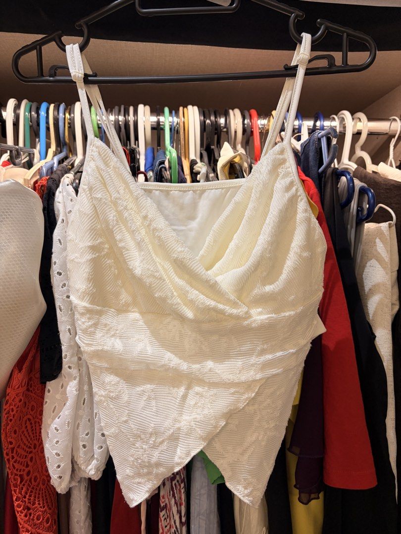 Various Tops ₱130 each (Category: Sleeveless) located in Makati City. Submitted by samfanny07845 (Listing ID 1469334870, Image 2). Description: - Style: Sleeveless halter neck crop top - Fabric: Lightweight with unique all-over textured crinkled detail - Fit: Adjustable ties at the back neck for a custom fit - Condition: Worn only once, super clean and well-maintained - Pairing: Great with high-waisted denim or skirts for warm weather outings.