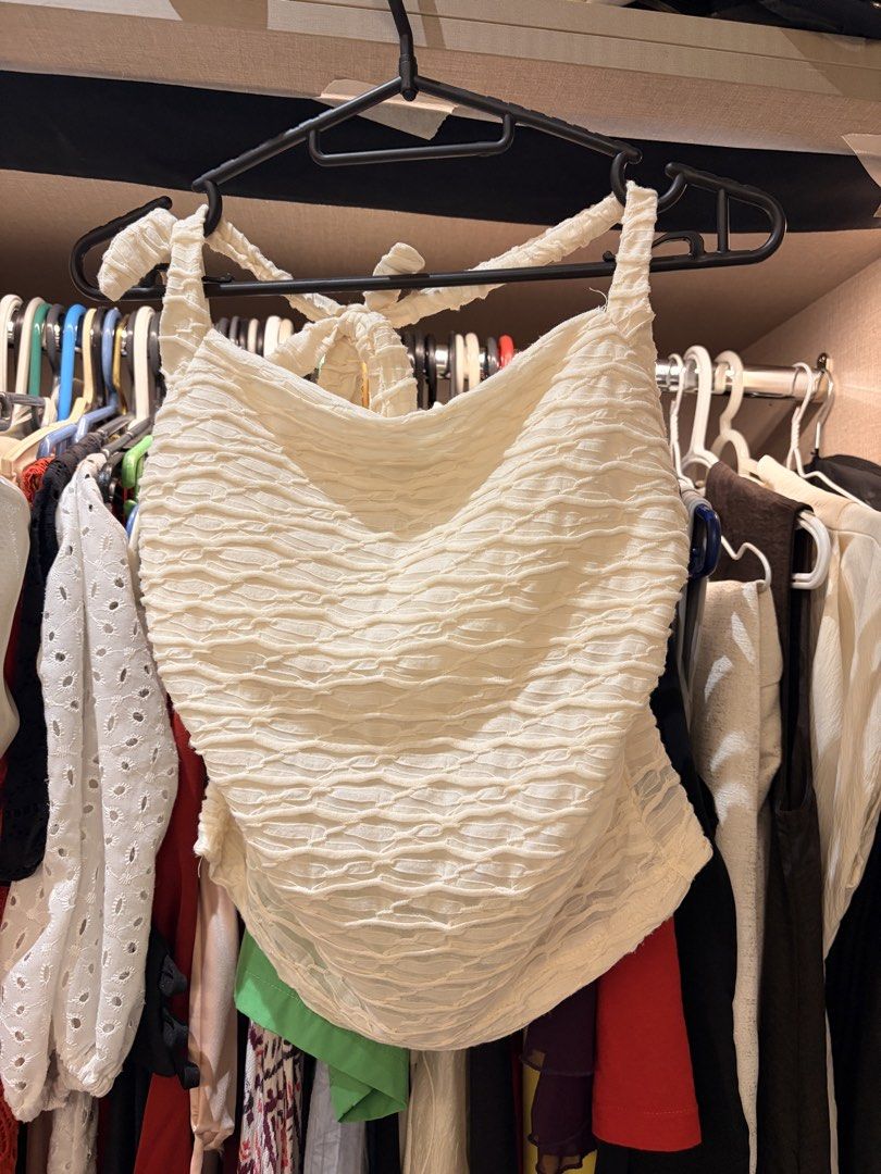 Various Tops ₱130 each (Category: Sleeveless) located in Makati City. Submitted by samfanny07845 (Listing ID 1469334870, Image 1). Description: - Style: Sleeveless halter neck crop top - Fabric: Lightweight with unique all-over textured crinkled detail - Fit: Adjustable ties at the back neck for a custom fit - Condition: Worn only once, super clean and well-maintained - Pairing: Great with high-waisted denim or skirts for warm weather outings.