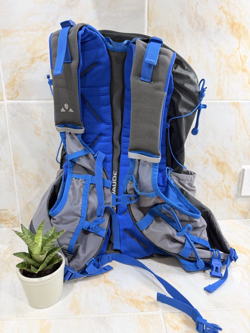 VAUDE Trail Spacer 18 Backpack (Category: Backpacks) located in Manila. Submitted by haveago0dthrift (Listing ID 1469281173, Image 2). Description: - Brand/Model: VAUDE Trail Spacer 18 - Color: Black and blue with blue cord details - Ideal for: Hiking and trail running - Features: Grey mesh pockets and adjustable straps - Sustainability: Green Shape label inside main compartment - Extras: Multiple attachment loops for gear.