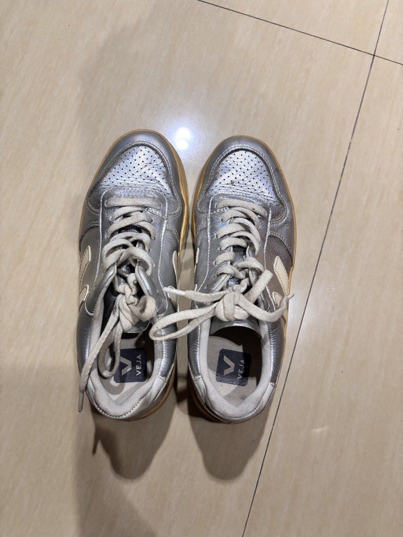 Veja Metallic Silver Campo Sneakers Size EU 37 (Category: Sneakers) located in Manila. Submitted by nkkyr (Listing ID 1469302244, Image 3). Description: Veja Campo sneakers in metallic silver leather. Contrast cream V logo on the sides and matching laces. Perforated toe box. Gum soles show natural yellowing from wear and age. Uppers have some creasing and surface scuffs. Size EU 37 printed on the inner tag..