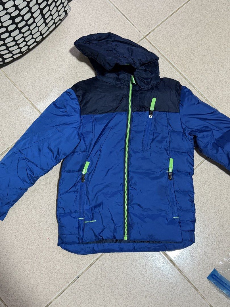 VentureLoft Hooded Puffer Jacket Blue Navy (Category: Babies & Kids Fashion) located in Quezon City. Submitted by wonderrv18 (Listing ID 1469184704, Image 1). Description: - Brand: VentureLoft - Color: Blue and navy with bright green zippers - Design: Lightweight quilted puffer with a zipped chest pocket and hood - Ideal For: Warm winter layer for kids - can fit up to 4-6 yrs old.