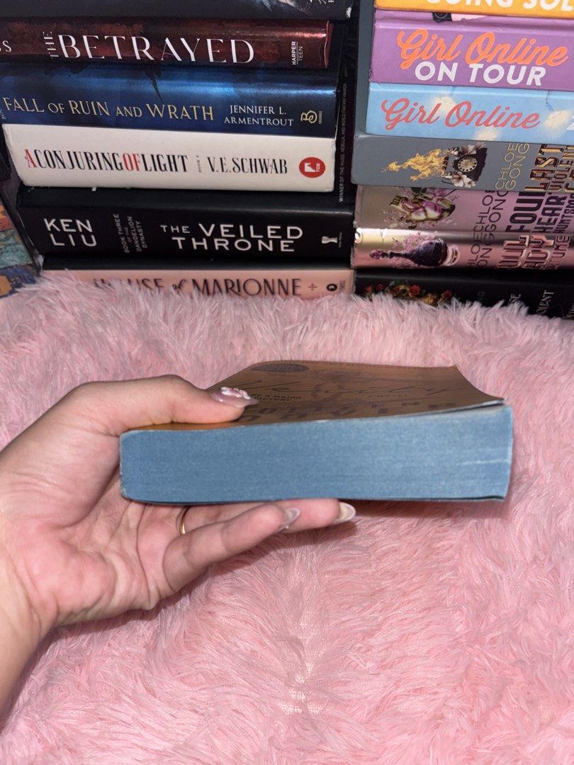 Verity by Colleen Hoover Novel Paperback (Category: Storybooks) located in Batangas. Submitted by solunarareads (Listing ID 1469202771, Image 3). Description: - Title: Verity by Colleen Hoover - Edition: Paperback with gorgeous blue painted edges - Special Feature: Includes the jaw-dropping epilogue - Condition: Read once, very good shape, clean pages, and solid spine - Perfect for: Psychological thriller fans before the movie comes out 📍Batanga
