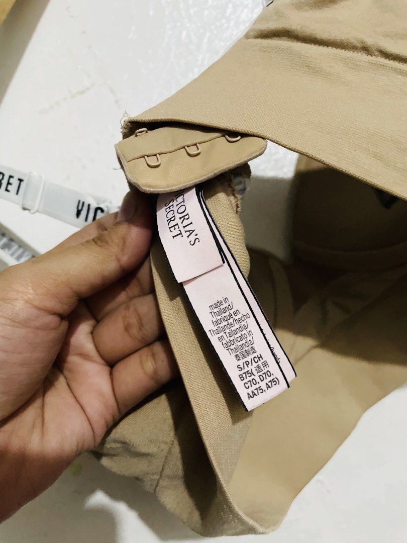 Victoria's Secret Beige Bralette (Category: Undergarments & Loungewear) located in Caloocan City. Submitted by lovemyclothes21 (Listing ID 1469264351, Image 3). Description: - Brand: Victoria's Secret - Color: Classic beige with white branded elastic straps - Size: S (fits B75, C70, D70, AA75, A75) - Closure: Back hook-and-eye - Style: Comfortable everyday bralette with soft, stretchy fabric - Condition: Clean and well-maintained.