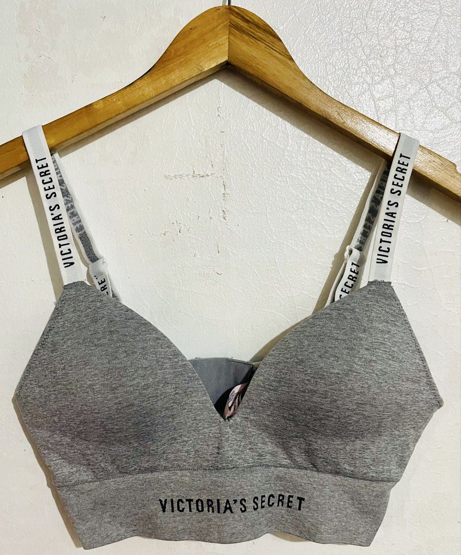 Victoria's Secret Grey Logo Strap Bralette (Category: Undergarments & Loungewear) located in Caloocan City. Submitted by lovemyclothes21 (Listing ID 1469262629, Image 1). Description: Grey Victoria's Secret bralette, heather finish. Signature logo elastic straps, adjustable for fit. Back hook and eye closure. Soft ribbed band under bust with branded text. Tag shows size S/P and equivalent international sizing. Made in Thailand..