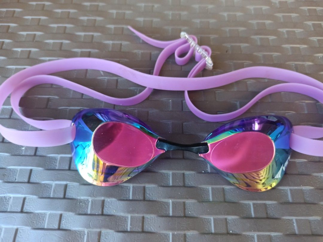 VIEW Swimming Goggles with Case (Provided) Excellent condition (Category: Water Sports) located in Caloocan City. Submitted by rtarellano (Listing ID 1469286531, Image 2). Description: - Brand: VIEW swim goggles - Design: Mirrored lenses with a stylish purple silicone strap and adjustable buckle - Condition: Used a few times, lens coating is still highly reflective - Performance: Excellent watertight seal and clear, anti-fog underwater vision - I