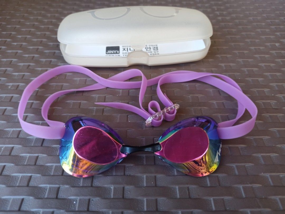 VIEW Swimming Goggles with Case (Provided) Excellent condition (Category: Water Sports) located in Caloocan City. Submitted by rtarellano (Listing ID 1469286531, Image 1). Description: - Brand: VIEW swim goggles - Design: Mirrored lenses with a stylish purple silicone strap and adjustable buckle - Condition: Used a few times, lens coating is still highly reflective - Performance: Excellent watertight seal and clear, anti-fog underwater vision - I