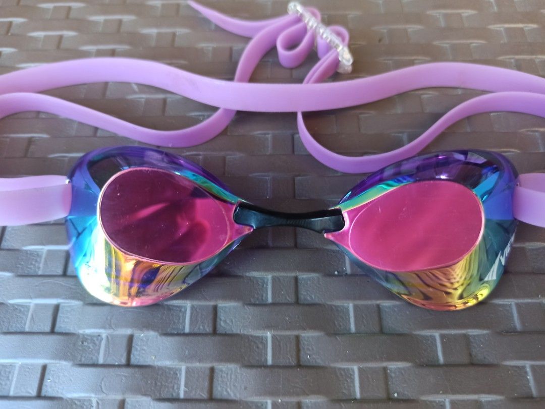VIEW Swimming Goggles with Case (Provided) Excellent condition (Category: Water Sports) located in Caloocan City. Submitted by rtarellano (Listing ID 1469286531, Image 3). Description: - Brand: VIEW swim goggles - Design: Mirrored lenses with a stylish purple silicone strap and adjustable buckle - Condition: Used a few times, lens coating is still highly reflective - Performance: Excellent watertight seal and clear, anti-fog underwater vision - I