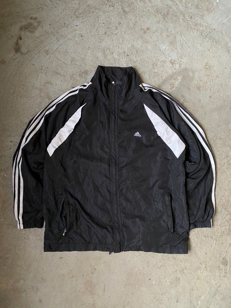 Vintage Adidas Black Track Jacket XL (Category: Coats, Jackets and Outerwear) located in Real. Submitted by koymiksbuynsell (Listing ID 1469266792, Image 1). Description: 21 width 27 length .