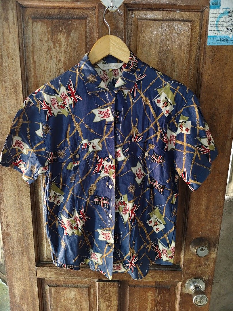 Vintage Burberry Buttondown Polo (Category: Tshirts & Polo Shirts ) located in Iloilo. Submitted by branded-boy0422_16 (Listing ID 1469167061, Image 1). Description: W: 18 L: 25 Good as new issue: last pic Missing one button check last photo easy to replace.
