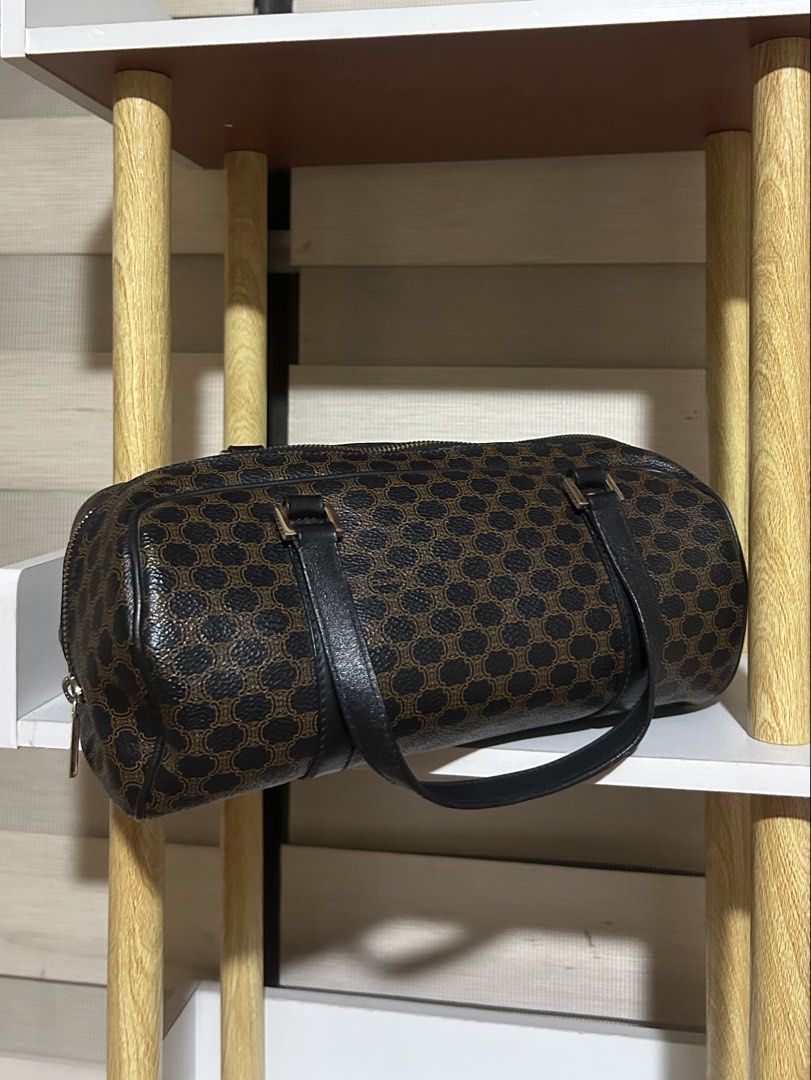 Vintage Celine Macadam Papilon Handbag (Category: Luxury Bags & Wallets) located in Quezon City. Submitted by elscloset2025 (Listing ID 1469338708, Image 1). Description: WITH ENTRUPY AUTHENTICATION - Brand: Celine - Style: Barrel bag / Cylindrical shoulder bag - Color/Pattern: Classic brown monogram with black accents - Material: Sturdy coated canvas with black leather straps - Hardware: Gold-tone hardware with embossed branding - Closure: Conve