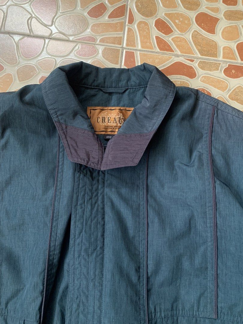 Vintage CREA Collection Dark Green Casual Jacket (Category: Coats, Jackets and Outerwear) located in Lipa City. Submitted by thriftshopp042 (Listing ID 1469201248, Image 3). Description: - Color: Dark green with contrast piping - Style: Vintage CREA collection, standard fit - Features: Collared neck, button closure, front pockets, ribbed hem - Material: Lightweight, ideal for cooler weather layering.