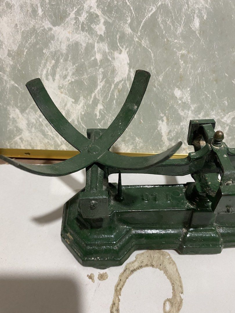 Vintage Green Cast Iron Countertop Scale (Category: Health Monitors & Weighing Scales) located in Calamba. Submitted by chebvintagedepot (Listing ID 1469248805, Image 2). Description: (B23-01) “An antique cast-iron balance scale with its original-style green-painted finish and traditional design. The scale has a lovely aged appearance, making it an interesting piece for collectors of vintage weighing equipment or for use as a decorative display i