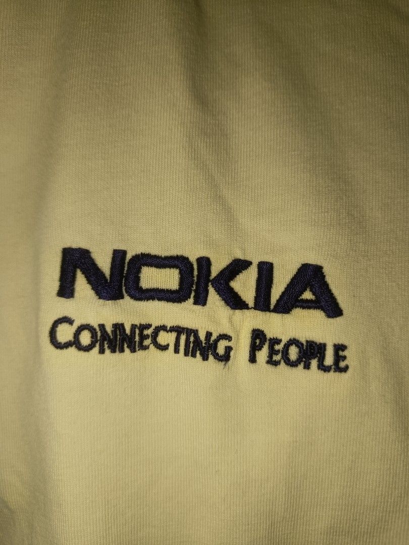 Vintage Jonathan Corey 1990s Nokia Promo/Tech Polo (Category: Tshirts & Polo Shirts ) located in Santa Rosa. Submitted by animalinstinct.617 (Listing ID 1469291690, Image 1). Description: Late 90s Nokia Connecting People corporate embroidery on a Jonathan Corey pique knit blank. Medium on Tag. Dimes: W21.5*L29 Issue: Stains.