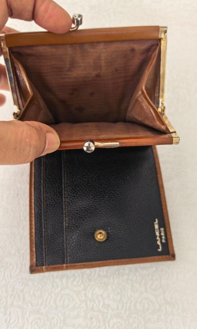 Vintage Lancel Kisslock wallet (Category: Wallets & Card holders) located in Tuguegarao City. Submitted by zenphoenix-7ad615 (Listing ID 1469200316, Image 3). Description: With bill slot With coin slot and card slot 3.80 by 4 inches.
