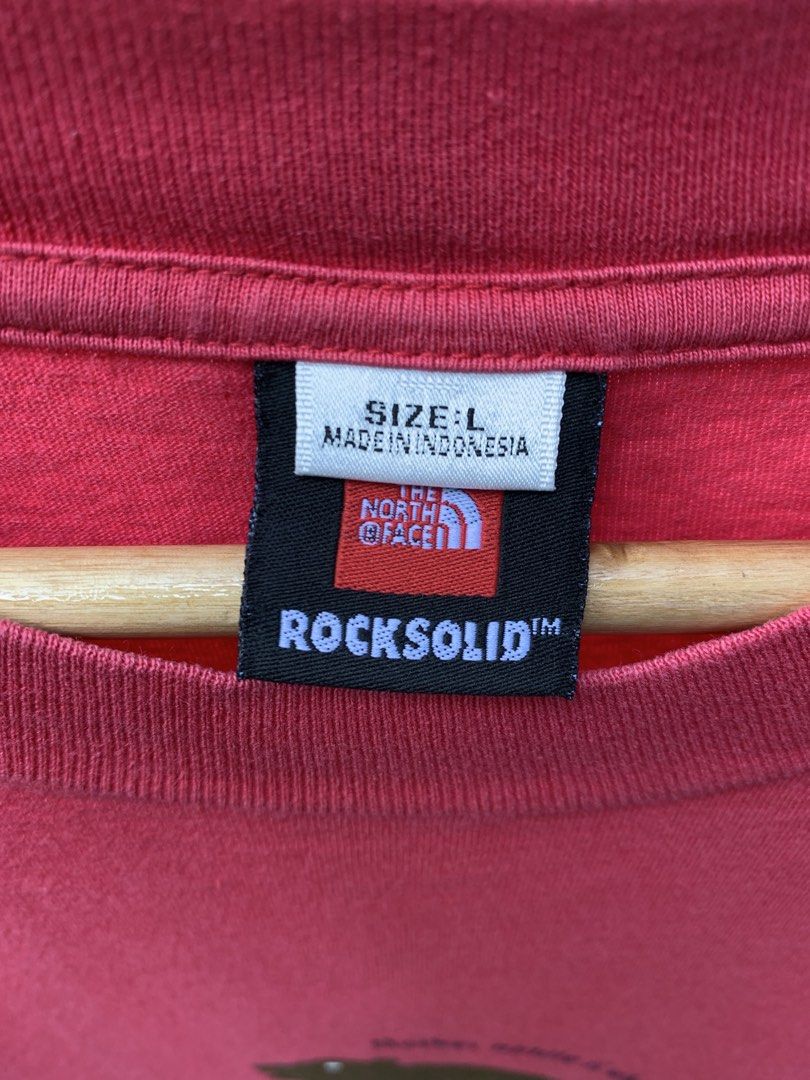 Vintage late 1990s/Y2K The North Face statement tee (Category: Tshirts & Polo Shirts ) located in Cagayan de Oro. Submitted by premium_thrifts (Listing ID 1469253134, Image 3). Description: Red colorway. Good condition. Double stitch on both sleeves and hem Fits Large L29" x W22" 20" (shoulder to shoulder) 8" (sleeve length) Issue: slight crackprint, and signs of fades Add shipping fee (via JRS or J&T).
