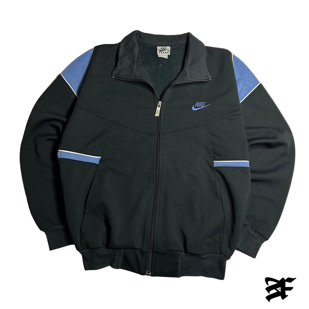 Vintage Nike Track Jacket (Category: Tshirts & Polo Shirts ) located in Antipolo. Submitted by wvyfrnds (Listing ID 1469169839, Image 1). Description: Vintage Nike Track Jacket Size: S Color: Gray/Blue Dimensions (Inches): Length: 23.5 Width: 21 Color Rate: 9/10 Issues - NONE 495 PLUS SF.