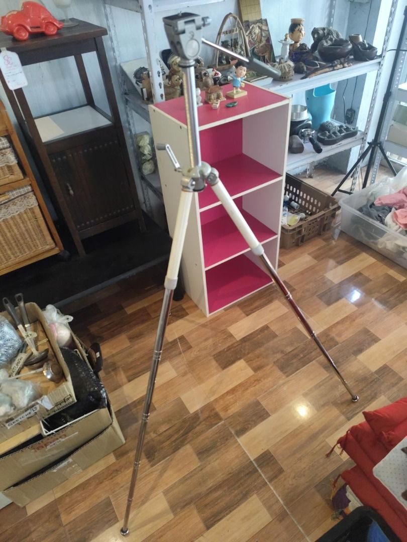 Vintage SLIK Camera Tripod (Category: Tripods & Monopods) located in Caloocan City. Submitted by purelion.ec38b3 (Listing ID 1469281557, Image 3). Description: - Vintage SLIK camera tripod, proudly Made in Japan - Classic metal build featuring stylish white leg sections - Integrated pan head handle for smooth adjustments - Fully functional knobs and mechanical adjustments - Standard mounting screw compatible with most cameras - Shows minor scuffs