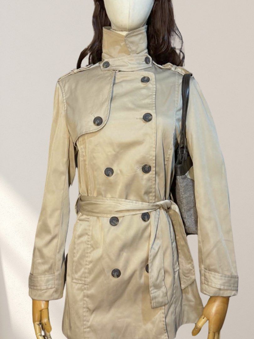Vintage Zara Basic Double-Breasted Khaki Trench Coat XS (Category: Coats, Jackets and Outerwear) located in Mabalacat. Submitted by lkp99 (Listing ID 1469274665, Image 1). Description: Laid flat measurements in cm: 43 cm W x 93 cm L ★ Notes: - Like new condition but needs washing (please refer to the photos posted) - These are my own photos, do not grab - MOP: BPI/Maribank - Shipping costs should be shouldered by buyer.