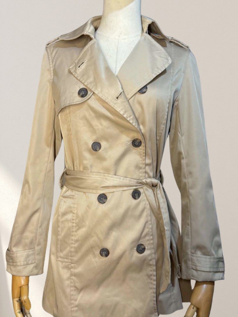 Vintage Zara Basic Double-Breasted Khaki Trench Coat XS (Category: Coats, Jackets and Outerwear) located in Mabalacat. Submitted by lkp99 (Listing ID 1469274665, Image 2). Description: Laid flat measurements in cm: 43 cm W x 93 cm L ★ Notes: - Like new condition but needs washing (please refer to the photos posted) - These are my own photos, do not grab - MOP: BPI/Maribank - Shipping costs should be shouldered by buyer.