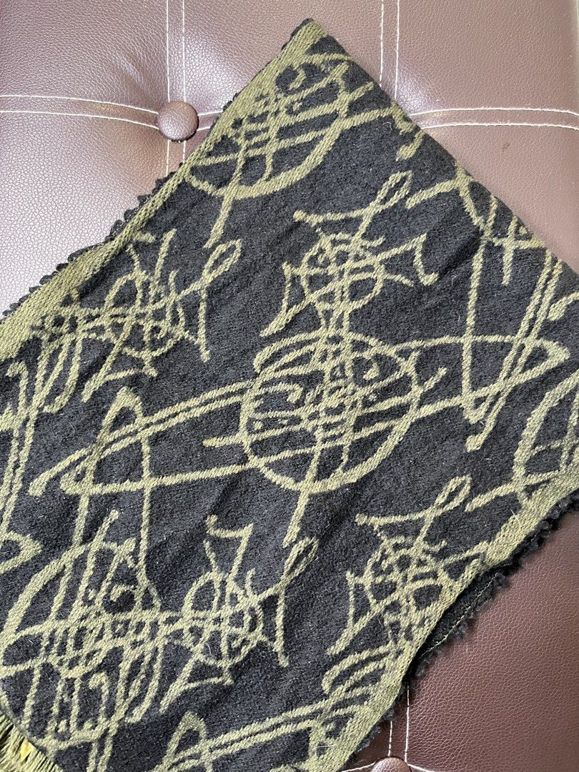 Vivienne Westwood Monogram Wool Scarf (Category: Scarves) located in Cabanatuan. Submitted by cabsygoods (Listing ID 1469167400, Image 3). Description: Vivienne Westwood Monogram Wool Scarf Authentic Very good condition No issue Color rate 9/10 Dm to purchase! 📩.