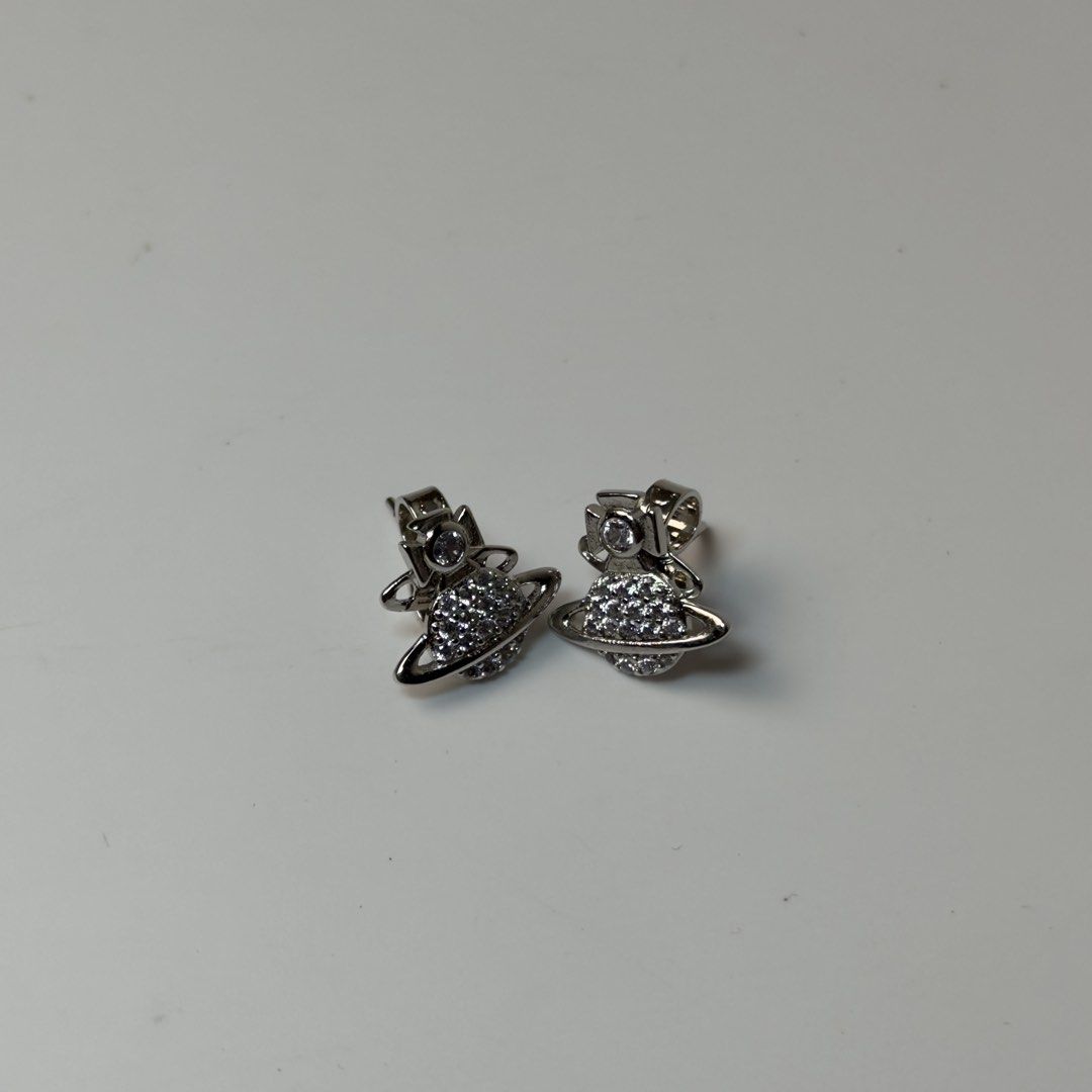 Vivienne Westwood Tamia Orb Stud Earrings (Category: Luxury Accessories) located in Manila. Submitted by streetsavvy (Listing ID 1469277504, Image 2). Description: Vivienne Westwood Tamia Orb Stud Earrings Made in Italy Brand New With Pouch.