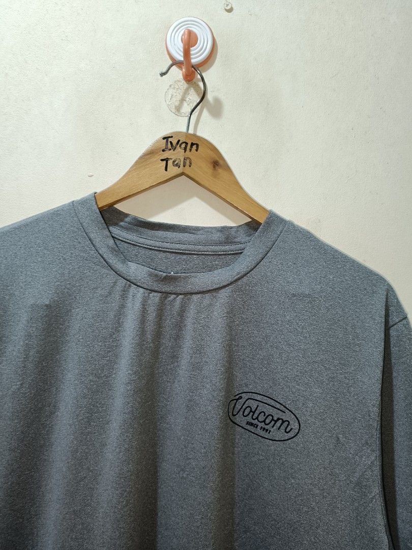 Volcom Shirt (Category: Tshirts & Polo Shirts ) located in Makati City. Submitted by ivsseyow03 (Listing ID 1469278963, Image 3). Description: Volcom grey t-shirt, short sleeves. Small logo on the chest, larger logo on the back. Crew neck collar. Tag reads XL/XLARGE. Made of 88% polyester and 12% elastane. Manufactured in China..