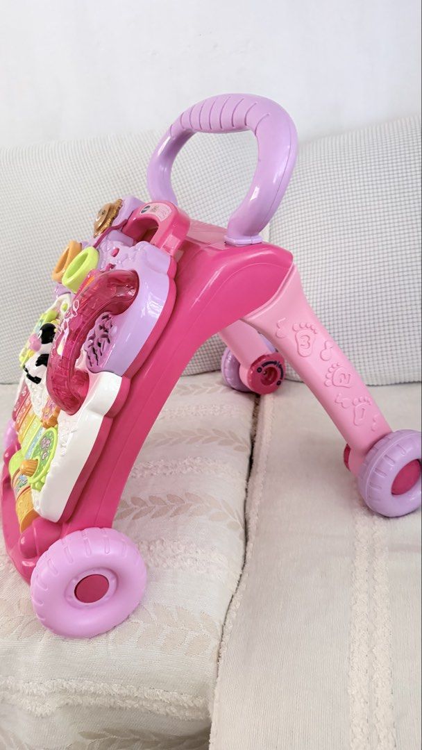 VTech Sit-to-Stand Learning Walker Pink (Category: Infant Playtime) located in Imus. Submitted by gclmom (Listing ID 1469197052, Image 3). Description: - only issue is the little crack sa #2 The rest is like new and working With freebie Lalamove only Loc imus cavite.